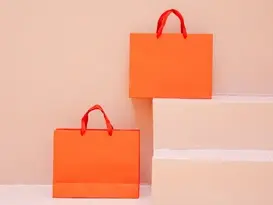 Shopping bags representing an employee experience strategy focused on treating employees like valued customers.
